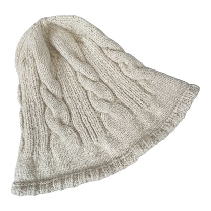 Manos de Yuraq - Gorro con trenzas
